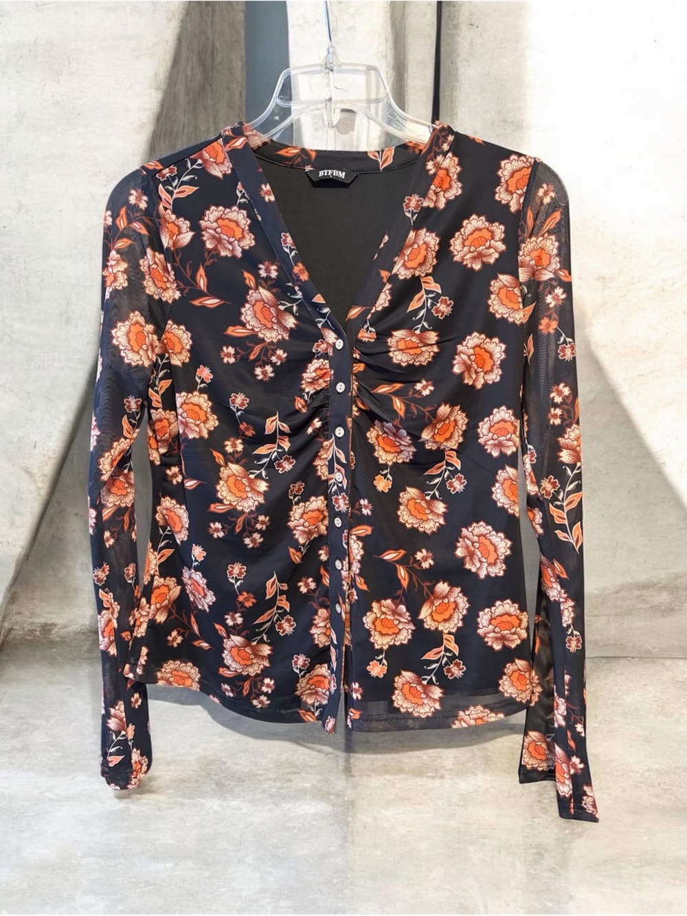 Betsey Floral Ruched Button-Front Long Sleeve Top in Black and Orange